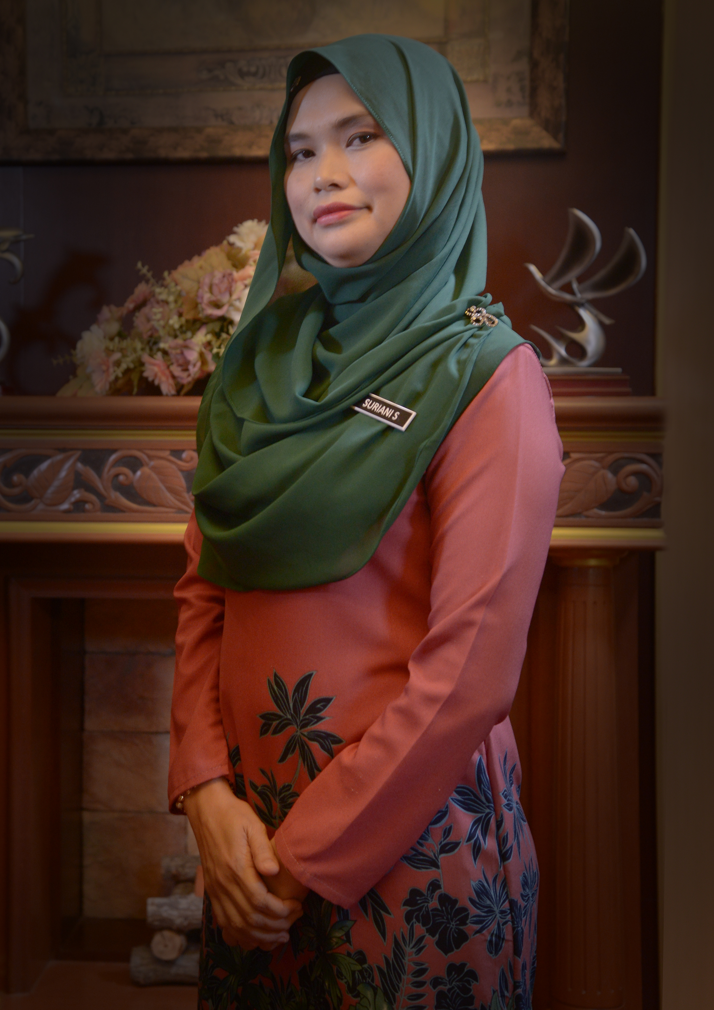 Pn. Suriani binti Saini