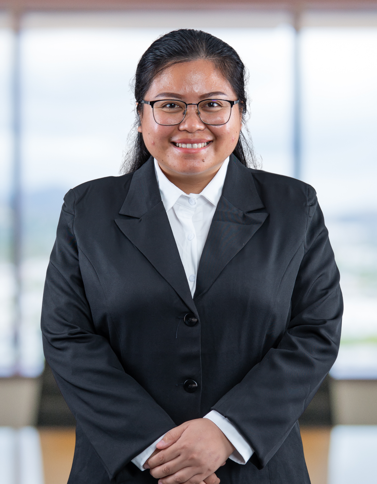 Pn. Petronella Gilison